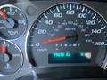 Dashboard of a 2022 GMC Savana showing speedometer fuel gauge and odometer reading 99650 km