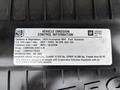 A 2020 Chevrolet Express vehicle emissions control information label detailing fuel type and regulatory standards