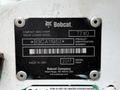 A black identification plate for a 2017 Bobcat T740 compact skid steer track loader with product information and patent details