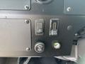 Dashboard controls of a 2020 Freightliner MT45 including switches for panel lights and wiper washer