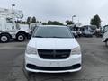 2014 RAM Cargo Van with a white exterior facing forward featuring a black grille and headlights