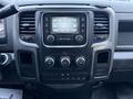2018 RAM 5500 dashboard with a central touchscreen display and control knobs for climate and audio settings