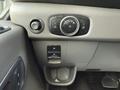 Close-up of a 2021 Ford Transit dashboard control panel featuring dials and buttons for lighting and other vehicle functions