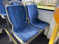 Two blue patterned seats inside a 2016 Grande West Vicinity bus