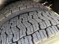 Close-up of a tire tread on a 2017 Freightliner MT45 displaying deep grooves and patterns designed for grip and traction