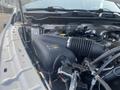 Engine compartment of a 2016 RAM 5500 featuring a large black air intake tube and various engine components with visible wiring and labels