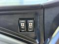 Two control switches for the fans labeled Left Fan and Right Fan with settings for low and high speeds in a 2013 International CE300 vehicle