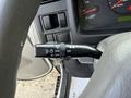 The image shows the steering column of a 2008 International CityStar featuring a control lever for headlights and turn signals