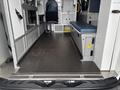 2020 Mercedes-Benz Sprinter 2500 interior showing a spacious cargo area with metal flooring and storage compartments along the sides
