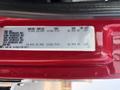 A label on a 1999 Freightliner FL80 displaying specifications including axle weight limits tire sizes and air pressure requirements