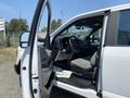 A 2017 Ford F-250 SD interior view showing the driver's side door open with a gray driver's seat and dashboard visible