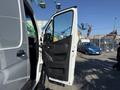 A 2023 Mercedes-Benz Sprinter 2500 with an open front door showcasing the interior features and spacious cabin design