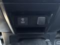 A close-up view of a 2022 Ford F-350 SD interior featuring a USB-C port and a small compartment below for storage