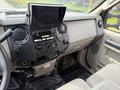 Interior view of a 2008 Ford F-550 showing the dashboard with controls display and touchscreen monitor