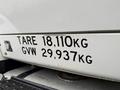 A 2014 International 7500 truck displaying a weight plate with tare weight of 18110 kg and gross vehicle weight of 29937 kg