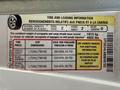 Tire and loading information label for a 2008 Ford Econoline detailing seating capacity tire sizes and pressure requirements