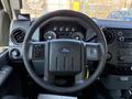 Interior view of a 2012 Ford F-350 SD showing the steering wheel dashboard controls and instrument cluster