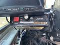A control panel featuring various buttons and knobs for a Whelen Traffic Advisor with power and direction indicator settings