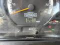 The dashboard of a 2012 Autocar Xpert displaying a mileage reading of 5661 miles and an additional counter showing 8751 miles