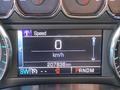 Dashboard display of a 2015 Chevrolet Silverado 1500 showing speed at 0 km/h and total distance of 207836 km