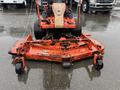 A 2012 Kubota F3680 lawn mower with an orange chassis and wide cutting deck equipped with rollers at the front and rear