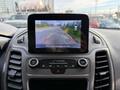 The dashboard of a 2020 Ford Transit Connect featuring a central touch screen displaying a rearview camera image with guidelines for parking