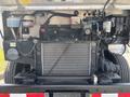 The image shows the engine compartment of a 2011 Workhorse W62 with visible components like the radiator, hoses, and various engine parts