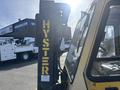 A 1993 Hyster H80XL forklift with a yellow and black color scheme featuring a prominent lift mast and the brand name "HYSTER" in large letters on the side