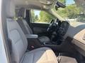 Interior of a 2017 Chevrolet Colorado featuring two front seats a central console and dashboard with controls