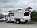A 2021 Freightliner M2 106 equipped with a Terex aerial lift bucket truck in a white and grey color scheme
