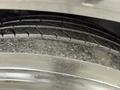 Close-up of a tire from a 2016 Grande West Vicinity showing tread pattern and surface texture