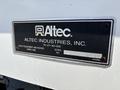 A metal identification plate attached to a 2019 Freightliner M2 106 displaying the Altec Industries logo and information including a phone number and serial number