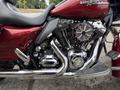 Close-up of a 2009 Harley-Davidson Road King showcasing the polished chrome engine components and mechanical details