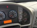 Dashboard of a 2016 International 7400 featuring gauges for speed RPM fuel volts and warning lights