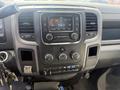 Dashboard of a 2016 RAM 5500 featuring a touchscreen display and various control knobs with car keys hanging from the ignition