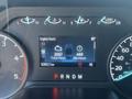 Dashboard display of a 2023 Ford F-350 SD showing total engine hours idle hours and odometer reading with temperature gauge and gear indicator