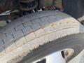 Close-up of a worn tire on a 2016 RAM 5500 showing visible tread wear and dirt on the surface
