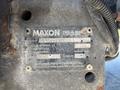 A metal identification plate labeled Maxon attached to a Hino 338 truck with model and capacity details visible