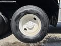 A close-up of a tire mounted on a 2006 International 7500 truck showing the tread pattern and rim details