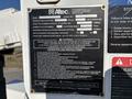 2006 Freightliner M2 106 truck with a service platform and equipment specifications displayed on a metal plate