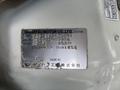 A 2010 Daihatsu Hijet identification plate displaying details such as type engine number and color information