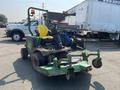 A 2012 John Deere 1445 Lawn Mower with a yellow seat and a low profile design featuring a wide cutting deck and front-mounted mowing blades