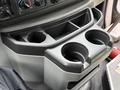 Cup holder console with three circular cup holders in a 2017 Ford E450