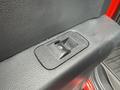 Close-up view of the window control switch on the door panel of a 2019 Ford F-150