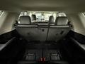 Interior view of a 2018 Toyota 4Runner with the rear seats folded down showing the spacious cargo area and black upholstery