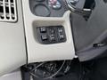 Control panel with buttons for air conditioning lights and panel display on the dashboard of a 2008 International 4300