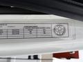 A label attached to a vehicle displaying specifications and pressure information for a 2012 International 7400