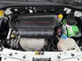 The engine compartment of a 2017 RAM ProMaster City showcasing the 24L MultiAir engine with various components including a coolant reservoir and battery