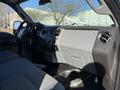 Interior of a 2010 Ford F-450 with a focus on the dashboard featuring a gray console and air conditioning vents