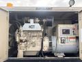 A 2005 Katolight SED60FPJ4 generator featuring an engine with a large fan an electrical panel and various controls